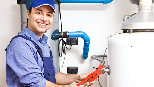 Plumber working on a water heater